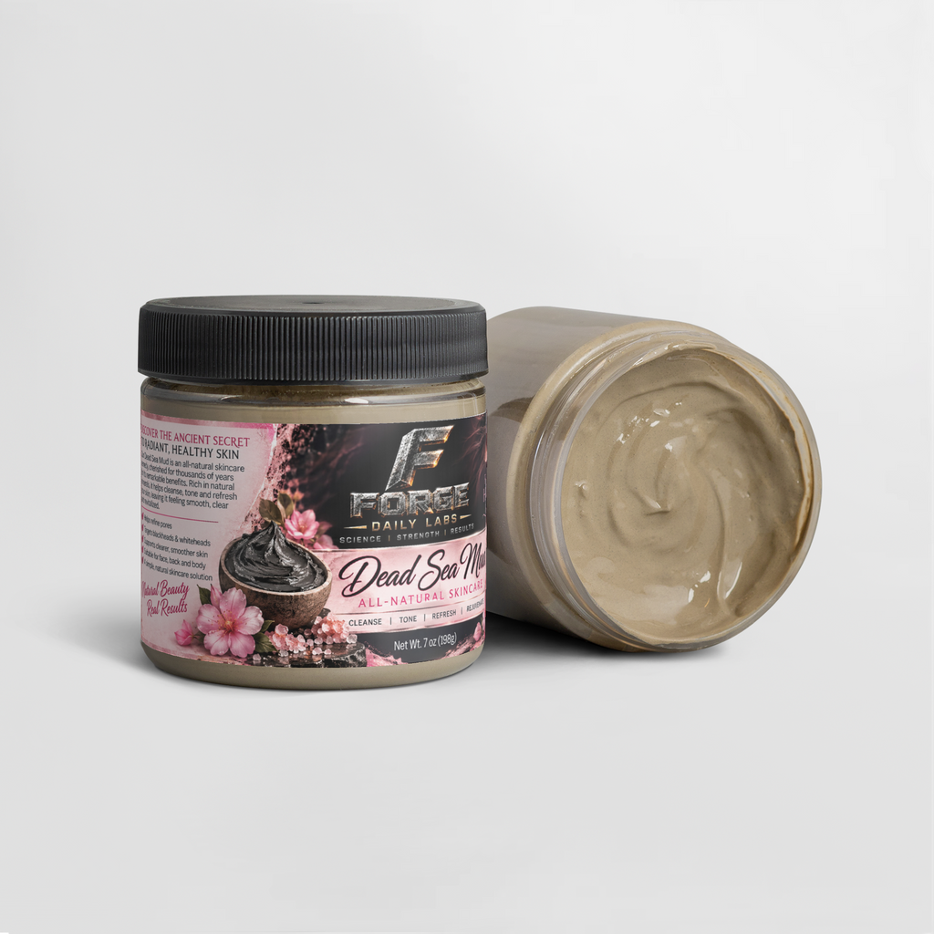 A jar of Dead Sea Mud body scrub by Force Daily Labs, with one closed jar showing the black lid and label, and one open jar showing the thick beige scrub inside, on a light gray background.