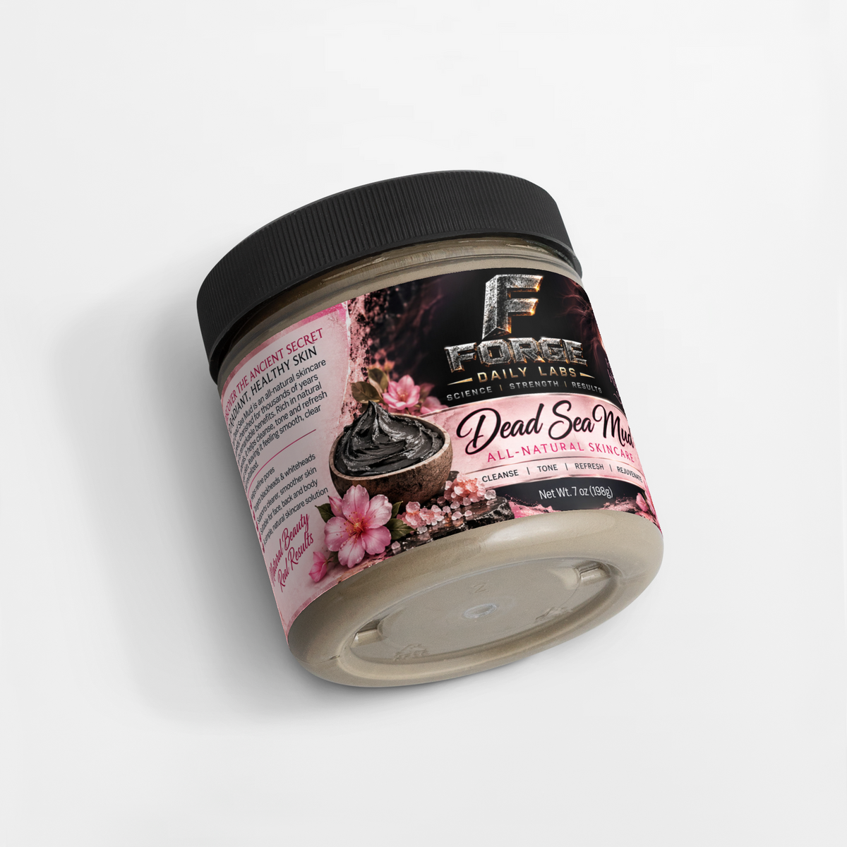 A jar of E-Force Daily Labs Dead Sea Mud Mask, featuring a black lid and a pink and black label with illustrations of pink flowers and a coconut, set against a clean white background.