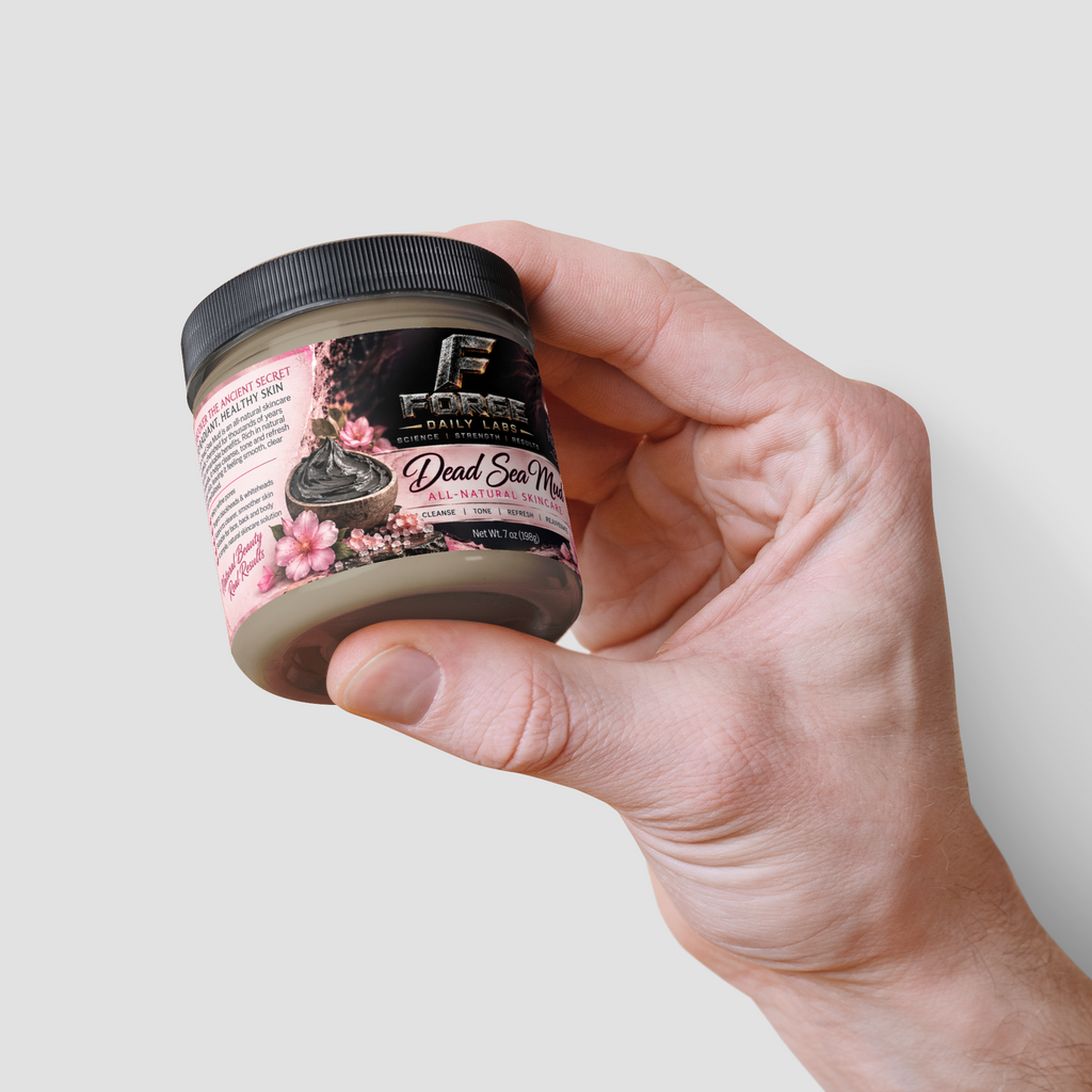 A hand holding a jar of Force Forensics Dead Skin Prep against a solid light gray background.
